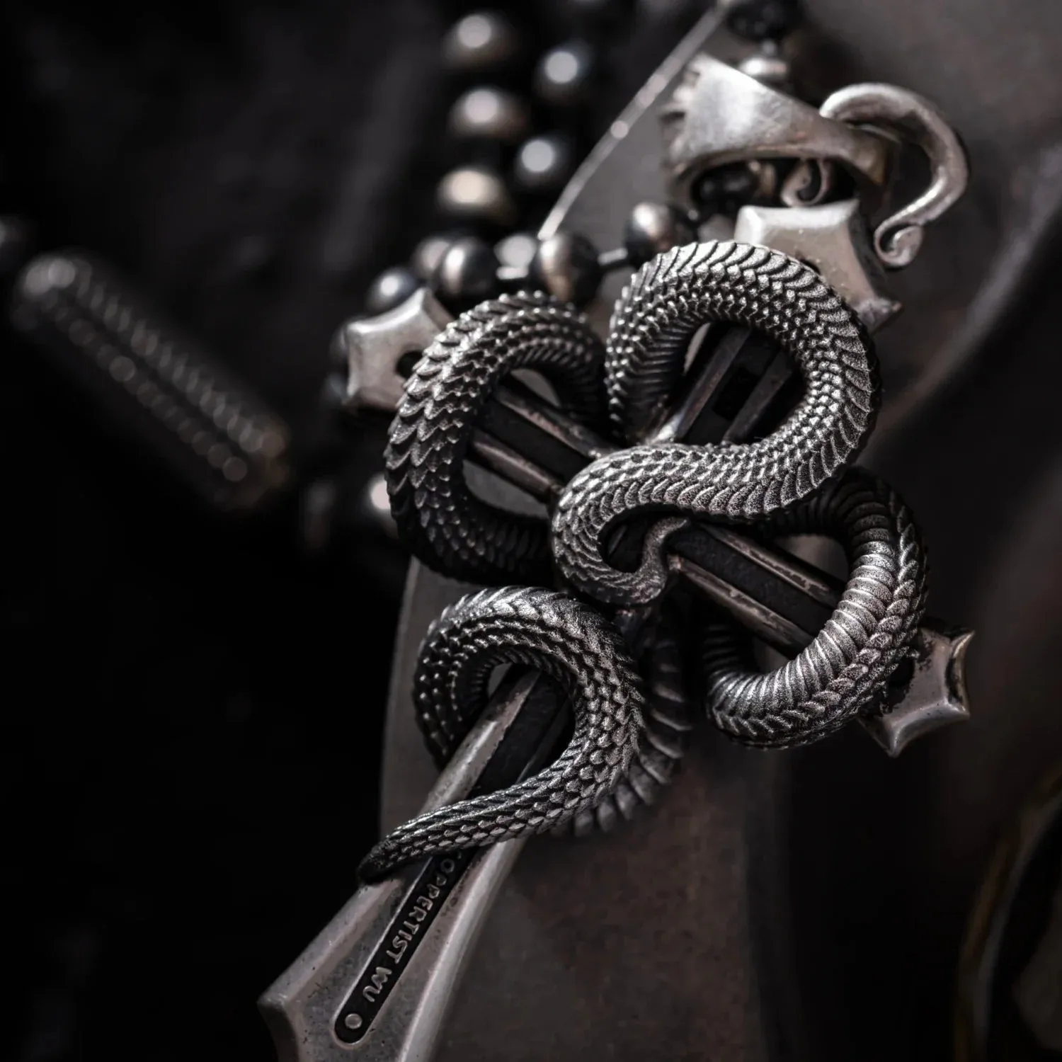 Double Snake Cross Pendant